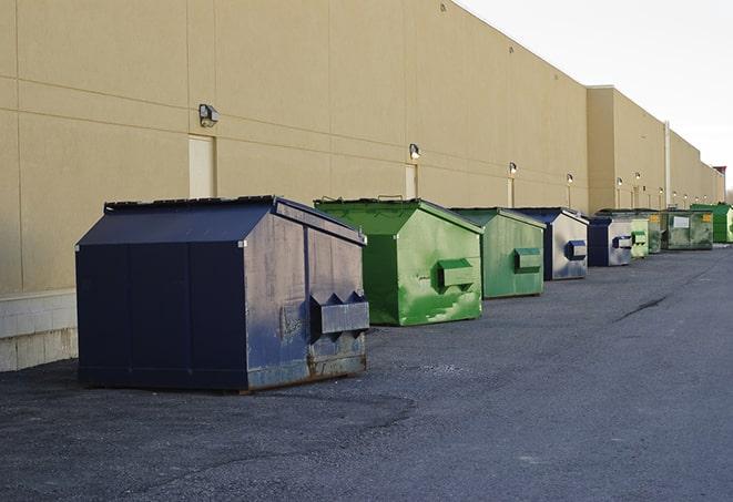 a construction dumpster on a work site filled with debris in Brambleton, VA